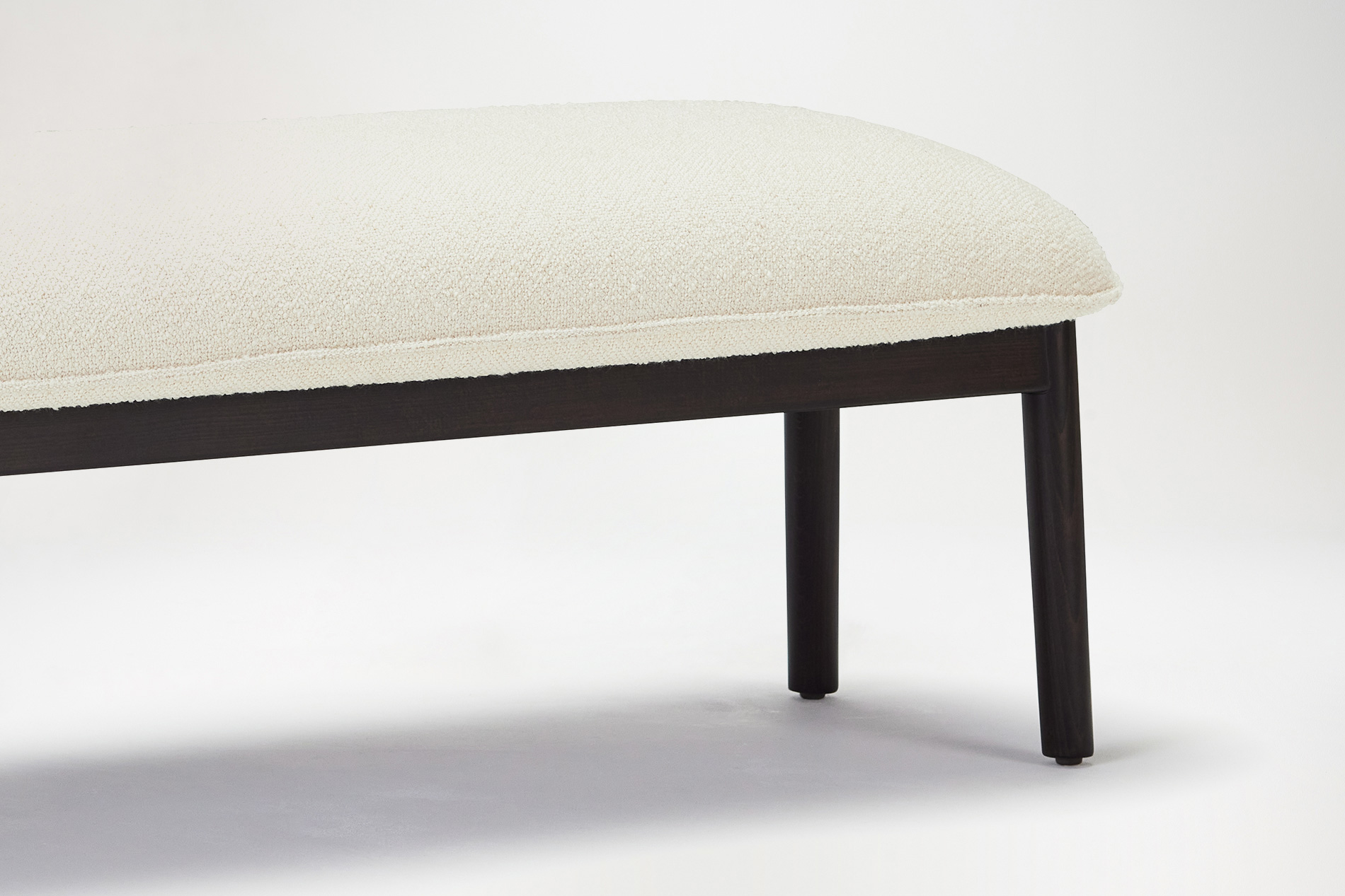 The evolution came very quickly, the idea was very square at first then chamfering the base upholstery gave it a unique looking form.CAROLINA BENCH 