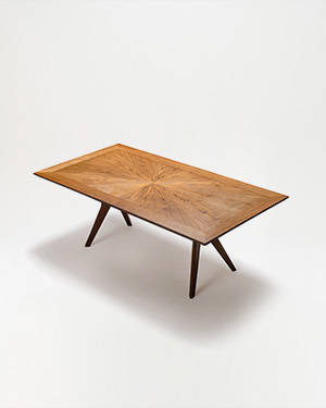 The Carpena Table stands as a testament to meticulous artistry.KARPENA MASA