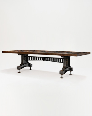 Crafted with precision, the Pau Table is a striking blend of industrial elegance.PAU TABLE