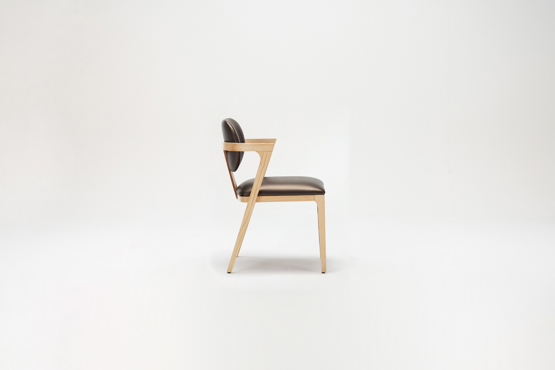 Enriched by wood accents, the design brings a unique aesthetic to spaces.VEEZY ARMCHAIR